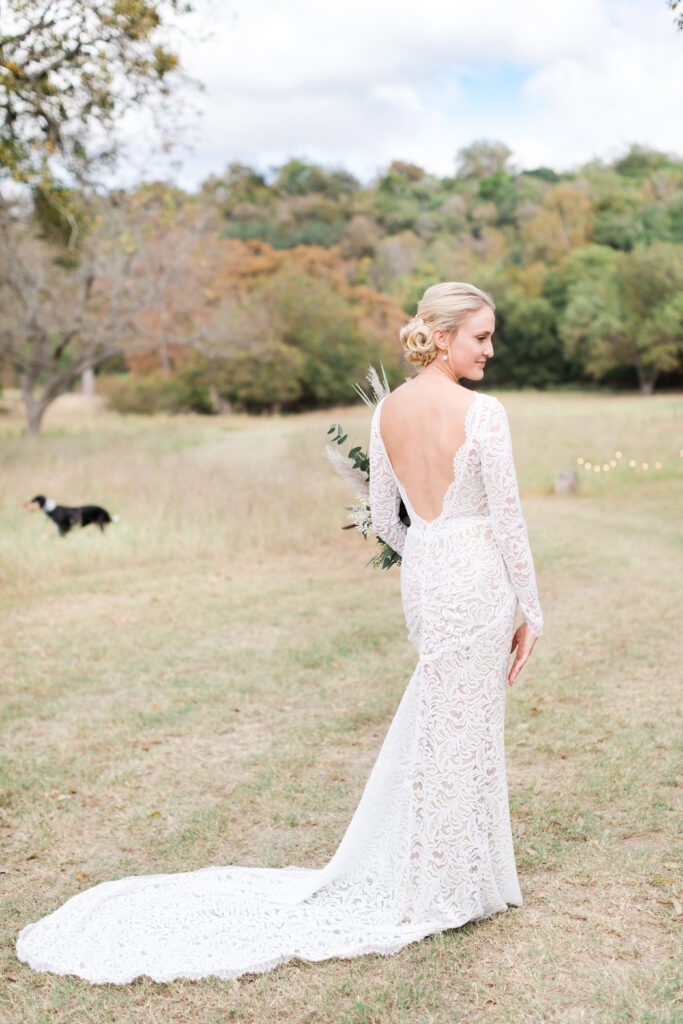 bride and dog on wedding day